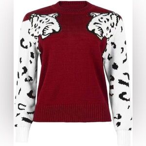 Women's Red and White cheetah arm Sweater. Size XL (fits a M/L)